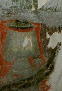 Painting on left corner
wall.