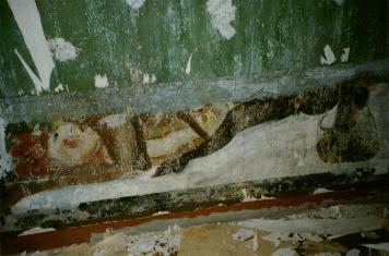 Right hand wall from
entering far side door.